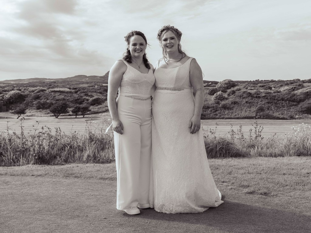 Couple posing during their elopement celebration photoshoot